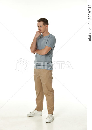 disappointed young man on white background. sadness disappointed young man on white background. sadness 112059736