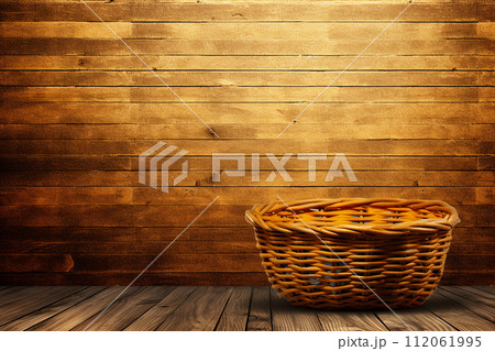 Wicker Basket with wood background and wooden table 112061995