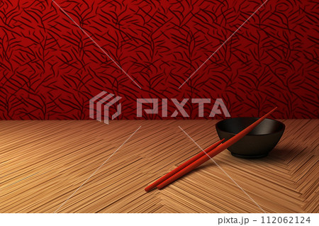 Red Chopsticks, Black Bowl on a Wooden Surface Red Chopsticks, Black Bowl on a Wooden Surface 112062124