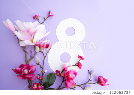 Almond flowers on blue background Almond flowers on blue background 112062787