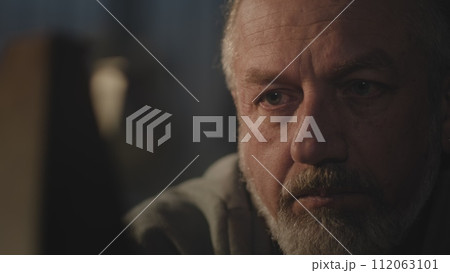 Close up of Caucasian artisan resting after working day 112063101