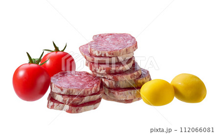 slices Spanish Fuet sausage salami with tomatoes and olives isolated on a white background. 112066081