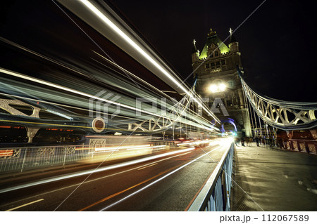 Tower Bridge and traffic light at twilight in London Tower Bridge and traffic light at twilight in London 112067589