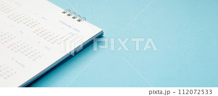 2021 calendar page on blue background business planning appointment meeting concept 2021 calendar page on blue background business planning appointment meeting concept 112072533