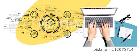 Future technology concept with person using a laptop Future technology concept with person using a laptop 112075714