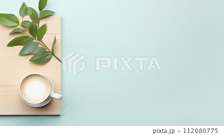 A Cup of Coffee on a Wooden Cutting Board A Cup of Coffee on a Wooden Cutting Board 112080775