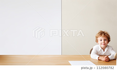 Little Boy Sitting at Table Little Boy Sitting at Table 112080782