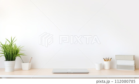 White Desk With Laptop and Potted Plant White Desk With Laptop and Potted Plant 112080785