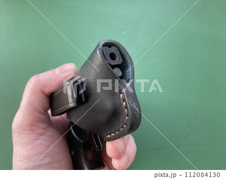 Revolver with holster for concealed carry of weapons Revolver with holster for concealed carry of weapons 112084130