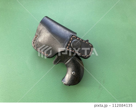 Revolver with holster for concealed carry of weapons Revolver with holster for concealed carry of weapons 112084135