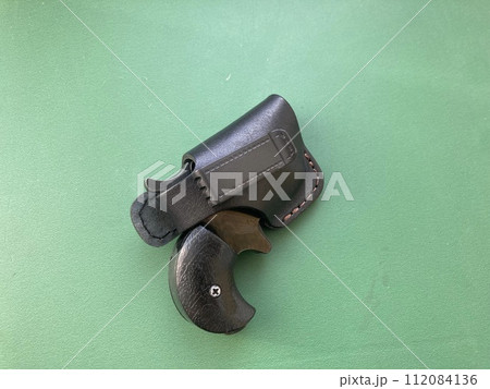 Revolver with holster for concealed carry of weapons Revolver with holster for concealed carry of weapons 112084136