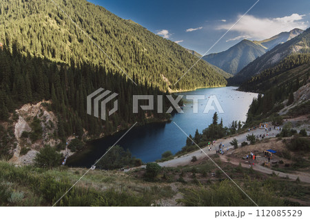 beautiful panoramic landscape with Kolsai Lake in the Tien Shan mountains in Kazakhstan on summer evening beautiful panoramic landscape with Kolsai Lake in the Tien Shan mountains in Kazakhstan on summer evening 112085529