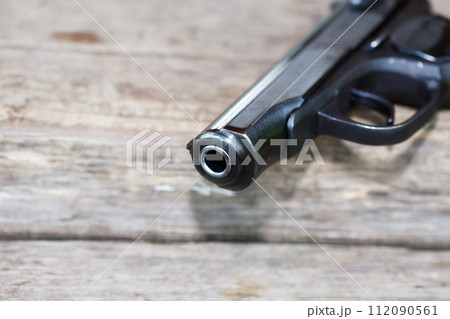 Handgun On Wood Handgun On Wood 112090561