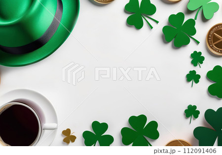 White frame background with green and golden three-leaved shamrocks, lucky Irish four leaf clover for St. Patricks Day holiday. Saint Patrick day symbol. Flat lay, top view, copy space in center 112091406