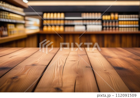 Empty table top with supermarket blurred defocused panorama, bokeh light. Backdrop for display or montage products. Blank wood textured counter with blur grocery, market store background. Front view 112091509