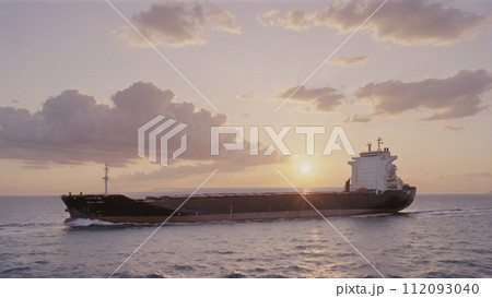 Large commercial freighter transports a wide variety of goods on oceans and sea routes around the world on long sea routes - ai generated 112093040