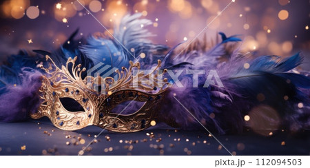 golden vintage style masquerade with a feather on purple background golden vintage style masquerade with a feather on purple background 112094503