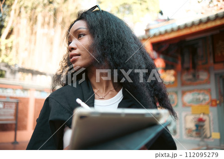 Asian woman enjoy travel in  downtown district 112095279