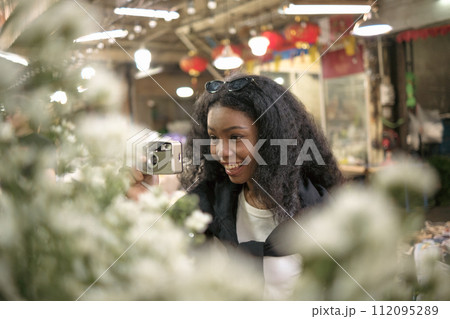 Asian woman enjoy travel in downtown district Asian woman enjoy travel in downtown district 112095289