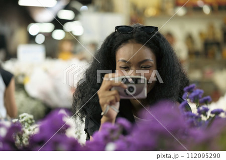 Asian woman enjoy travel in  downtown district 112095290