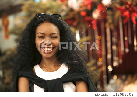 Asian woman enjoy travel in  downtown district 112095308