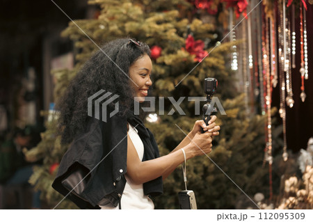 Asian woman enjoy travel in  downtown district 112095309