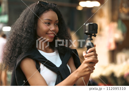 Asian woman enjoy travel in downtown district Asian woman enjoy travel in downtown district 112095310