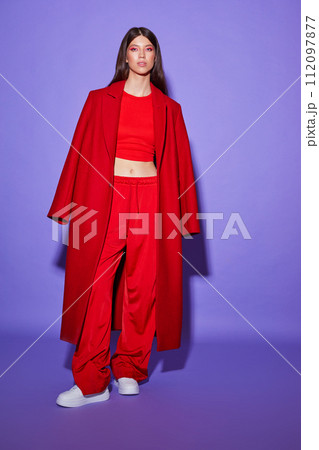 Fashion asian female model in red coat. 112097877