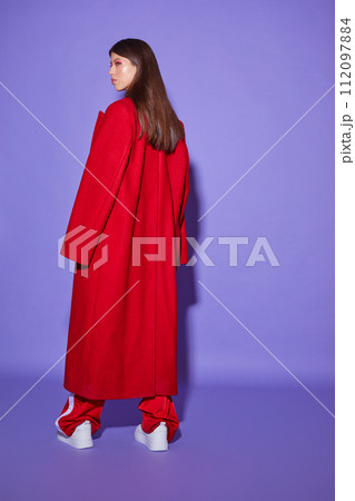 Fashion asian female model in red coat. 112097884