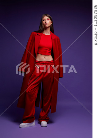 Fashion asian female model in red coat. 112097886