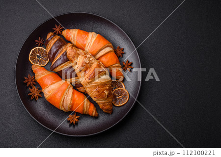 Delicious fresh, crispy French croissants with sweet filling  112100221