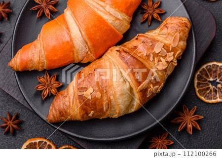 Delicious fresh, crispy French croissants with sweet filling  112100266