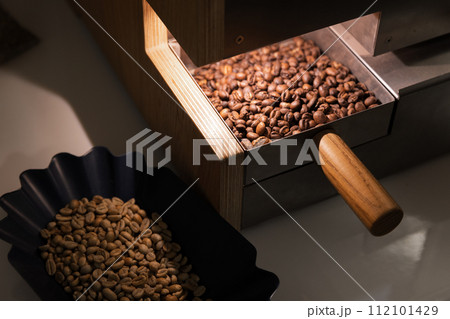 A portion of roasted arabica coffee beans just after roasting 112101429