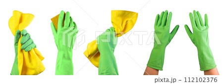 Hand in green gloves holding yellow cleaning polishing microfiber wiper set, isolated on white Hand in green gloves holding yellow cleaning polishing microfiber wiper set, isolated on white 112102376