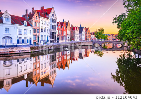 Bruges, Belgium. Sunrise over Spiegelrei Canal, Flanders cityscape 112104043