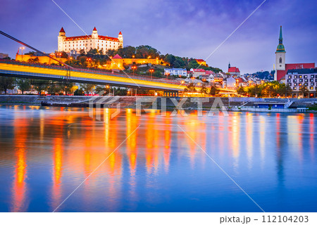 Bratislava, Slovakia. Bratislava Castle and old town over Danube River. Bratislava, Slovakia. Bratislava Castle and old town over Danube River. 112104203