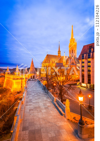 Budapest, Hungary. Matyas Cathedral on Buda Hill, illuminated on night. Budapest, Hungary. Matyas Cathedral on Buda Hill, illuminated on night. 112104226