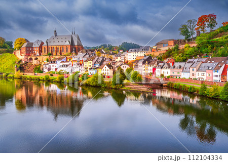 Saarburg, Germany - Old town and Saar River reflection. Saarburg, Germany - Old town and Saar River reflection. 112104334