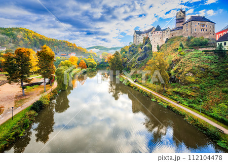 Loket, Czech Republic. Colorful town and Castle Loket over Ohre River in the near of Karlovy Vary, Bohemia. Loket, Czech Republic. Colorful town and Castle Loket over Ohre River in the near of Karlovy Vary, Bohemia. 112104478