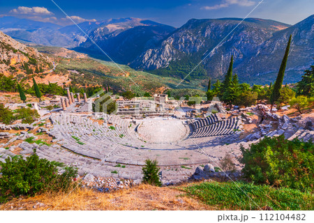 Delphi, Greece. Tholos ancient temple, sanctuary of Athena Goddess, classic Greek civilization. 112104482