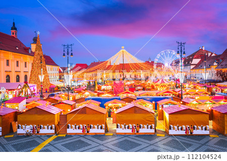 Sibiu, Romania. Christmas Market in Large Square, medieval downtown of Transylvania, famous European Xmas Fair. 112104524
