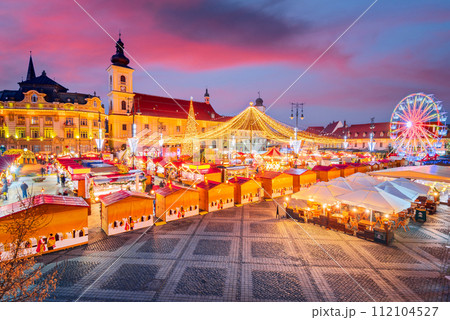 Sibiu, Romania. Christmas Market in Large Square, medieval downtown of Transylvania, famous European Xmas Fair. 112104527