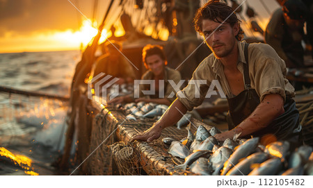 A group of fishermen is on a big boat in the sea. They are taking fish out of the nets, pulling them up one by one. Hardworking fishermen are hauling in their catch form the nets Generative AI. 112105482