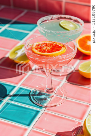 AI-generated content. Refreshing summer margarita cocktails with fruit slices and ice AI-generated content. Refreshing summer margarita cocktails with fruit slices and ice 112109790