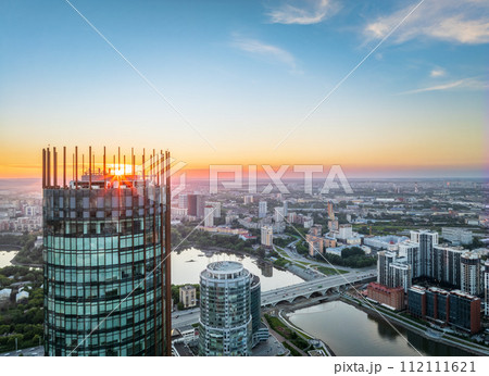 Yekaterinburg city and pond aerial panoramic view at summer sunset. 112111621