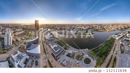Yekaterinburg city with Buildings of Regional Government and Parliament, Dramatic Theatre, Iset Tower, Yeltsin Center, panoramic view at summer sunset. 112111636