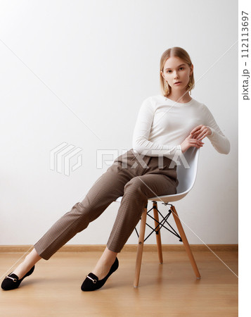 Beautiful female model. Fashionable confident Beautiful female model. Fashionable confident 112113697
