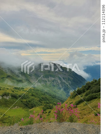 Green mountain hills and meadows on Krasnaya Polyana in Russia Green mountain hills and meadows on Krasnaya Polyana in Russia 112114896