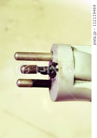 close up of white electric plug close up of white electric plug 112119469
