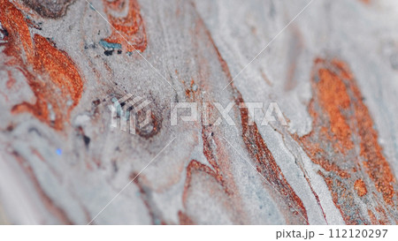 Paint spill marble fluid texture orange gray ink 112120297